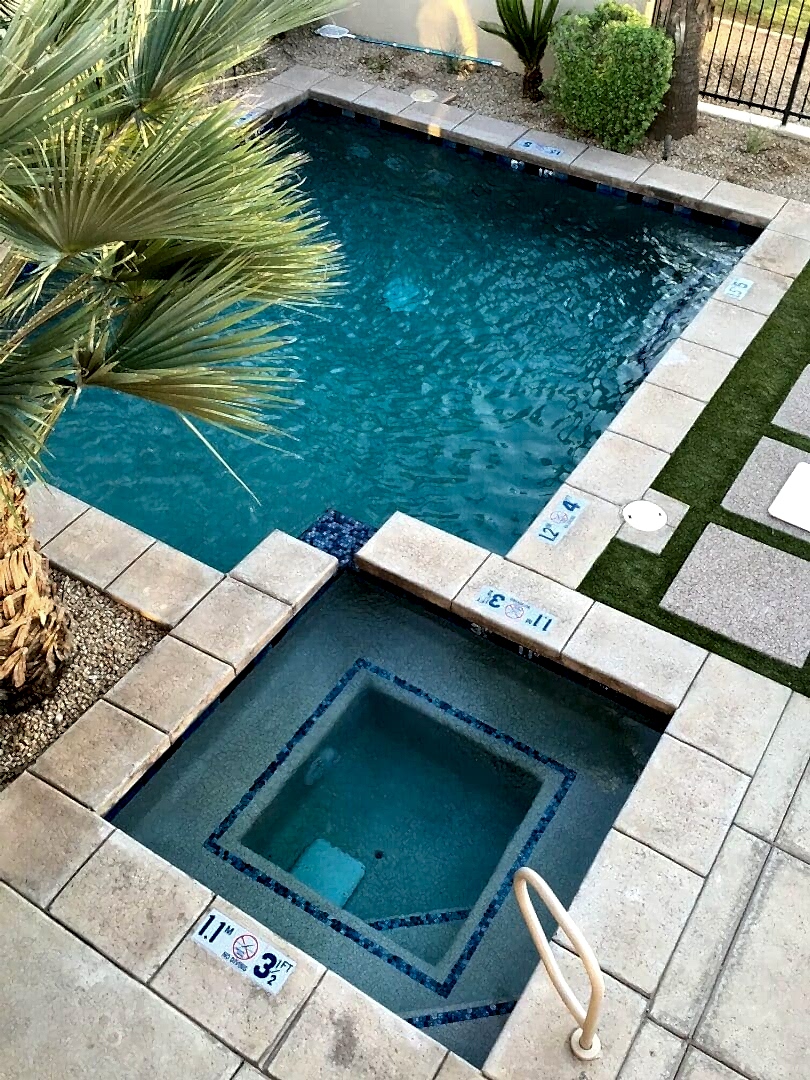 Pool and spa with depth markers.