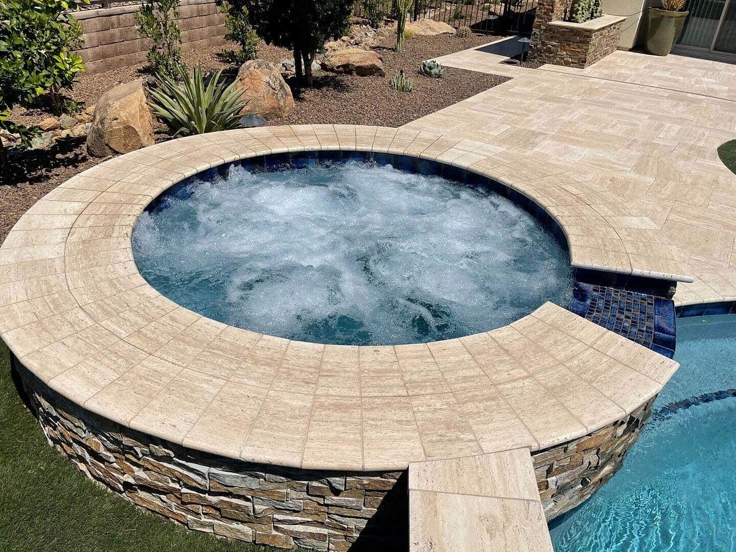 Bubbling spa in backyard oasis.
